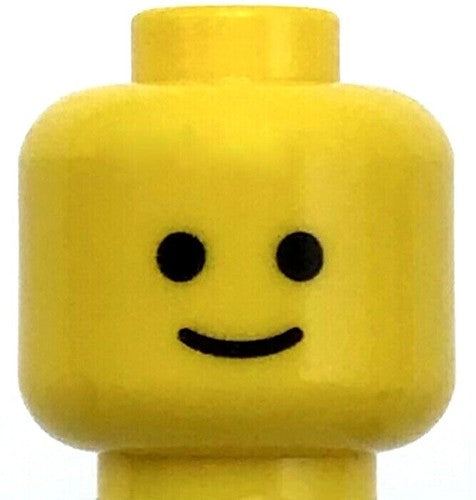 Genuine LEGO yellow minifigure head with standard grin